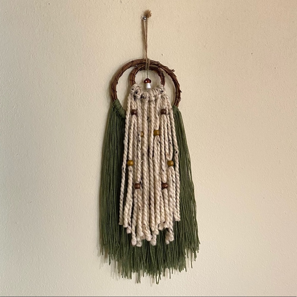 Earthy Bohemian yarn wall hanging decor with mushroom